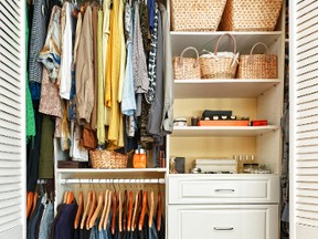 Clothes hung neatly in organized closet at home.