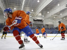 The Kingston Voyageurs, practising at the Invista Centre last month, opened their Ontario Junior Hockey League season with a 2-1 loss in Cobourg on Monday night. (Elliot Ferguson/The Whig-Standard)