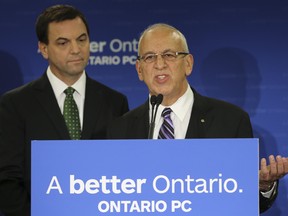 Progressive Conservative Leader Tim Hudak, left, and former Tory finance critic Peter Shurman. (JACK BOLAND/TORONTO SUN)