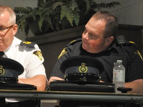 Perth County OPP Staff Sgt. Joel Skelding (left) and West Perth OPP Sgt. Dave Sinko were two officers who addressed the many questions asked during the community policing meeting held Sept. 10 at the Mitchell & District Community Centre.