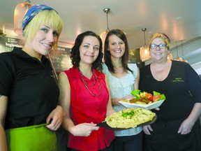 Vegup London's Katie Van Den Berg and Krista Kankula with Stephanie Gwynne and Chef Kat of Organic Works Bakery at the bakery in London, Ont. Sept. 6, 2013. Kankula, inspired by similar events elsewhere, is starting a vegan food festival in London this fall. (QMI Agency file photo)
