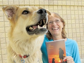 Evelyn Symons, author of The Barking Journal, with her rescue dog Seamus.