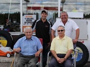 (Front) Roger Girard, the original owner of Girard Esso and Gerry Charron, one of the first employees in 1963, celebrating Saturday with Trevor and Ralph Girard (back).