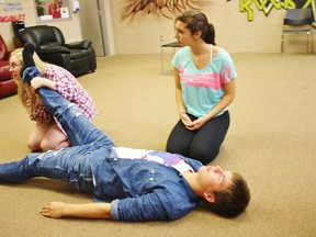 Ariel (Jenna Cimetta) looks on as Scuttle (Talyer Hartwick) checks for a pulse in Prince Eric's (Korey Broad) foot during a rehearsal of the Little Mermaid in Sarnia this week. Sarnia-Lambton Rebound is staging the production next weekend.
HEATHER YOUNG/ SARNIA THIS WEEK/ QMI AGENCY