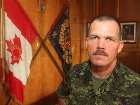 Lt.-Col. Joe Parkinson, standing in front of the regimental colours of the Princess of Wales' Own Regiment, will be the new commanding officer of the reserve unit, taking over Sept. 19.
Michael Lea The Whig-Standard