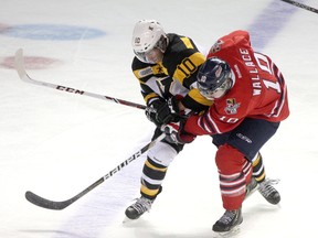 Kingston Frontenacs' Billy Jenkins battles for the puck with Oshawa Generals' Aiden Wallace in Ontario Hockey League exhibition play at the Rogers K-Rock Centre on Sept. 6. The Frontenacs are No. 9 in the Canadian Hockey League rankings, released Thursday. (Ian MacAlpine/The Whig-Standard)