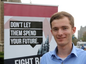 Tyler Lively, vice-president of the Queen's Students for Liberty and Generation Screwed. 
Ian MacAlpine The Whig-Standard