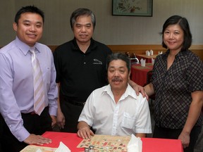 Odie Lam, owner of the Oriental Restaurant, with family and staff members, nephew Jason Lam, brother Hang Lam and sister-in-law Kitty Lam.
Ian MacAlpine The Whig-Standard