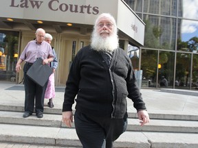 Archbishop Kenneth William (Seraphim) Storheim leaves the Law Courts Building after testifying in his own defence. (KEVIN KING/WINNIPEG SUN)
