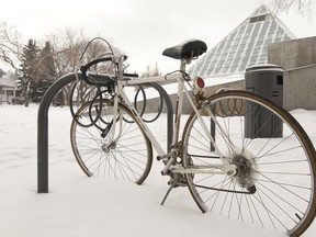 A bicycle parked outside Edmonton's Muttart Conservatory.