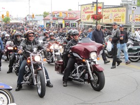 Bikers arrive in the Port Dover core during a Friday the 13th motorcycle rally.  MONTE SONNENBERG/ Simcoe Reformer file