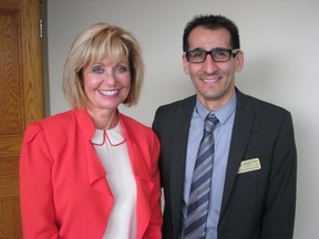 Judith Morris, president of Lambton College, stands with Medhi Sheikhazadeh, the college's dean of applied research and innovation, Friday at the announcement of more than $5 million in new federal research funding for the college. Sarnia, On., Sept. 13, 2013 PAUL MORDEN/ THE OBSERVER / QMI AGENCY