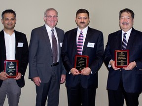 Bluewater Health recently celebrated its sixth annual Physician Appreciation Day. Pictured are: Dr. Karan Shetty, recipient of the Peer Recognition Award; Dr. Mark Taylor, Bluewater Health's chief of professional staff, vice-president of medical affairs and chief of quality, patient safety and risk management; Dr. Rajeev Suryavanshi, recipient of the Outstanding Physician of the Year Award; and Dr. Ken Yoshida, recipient of the Outstanding Contribution to the Hospital Award. SUBMITTED PHOTO/ FOR THE OBSERVER/ QMI AGENCY