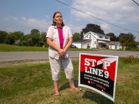 A sign in the yard of April Smith, who lives in the north end of Kingston, marks her opposition to the proposal to reverse and increase the flow of  Enbridge's Line 9. 
Sam Koebrich for The Whig-Standard