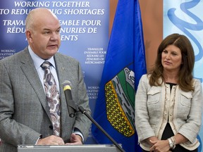 Alberta Health Minister Fred Horne (left) and Canadian Health Minister Rona Ambrose answer questions at a press conference announcing a new online reporting resource for drug shortages at the Kaye Edmonton Clinic at the University of Alberta in Edmonton, Alta., on Friday, Sept. 13, 2013. The website www.drugshortages.ca will be used by drug companies to voluntarily report shortages to Canadians. Ian Kucerak/Edmonton Sun/QMI Agency