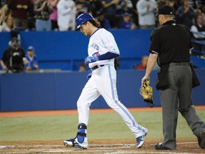 Blue Jays' Colby Rasmus crosses the plate after hitting a solo home run against the Orioles in the fifth inning in Toronto on Friday, Sept. 13, 2013. (Jon Blacker/Reuters)