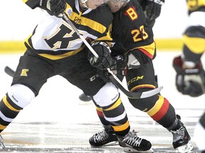 Kingston Frontenacs' Billy Jenkins fights for the puck against the Belleville Bulls' Niki Petti after a face-off during Friday night's OHL pre-season  game at the Rogers K-Rock Centre.
Michael Lea The Whig-Standard