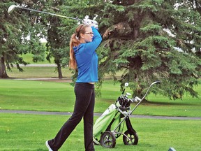 Emily Routly, 14, tees off the No. 8 hole Sept. 8 at the Vulcan Golf and Country Club during the annual Junior Golf Championship.