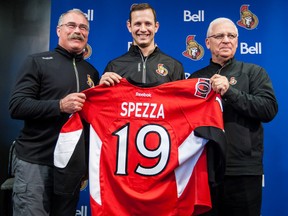 The Ottawa Senators announced Jason Spezza as their team captain during a press conference at the Canadian Tire Centre in Ottawa on Saturday September 14,2013. Jason poses for photos with head coach Paul MacLean (L) and General Manager Bryan Murray during the press conference. Errol McGihon/Ottawa Sun/QMI Agency