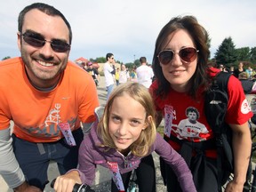 From left, Jason Weiler, Sloane Leighfield and Shelley Imbeault gear up for the 33rd Annual Terry Fox Run Sunday morning in Tillsonburg. Imbeault is living proof of the effectiveness of cancer research. Jeff Tribe/Tillsonburg News