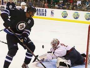 Former Belleville Bulls goalie Phillip Grubauer of the Washington Capitals stops Winnipeg Jets star Evander Kane during NHL exhibition action Saturday night at Yardmen Arena. (Jason Miller/The Intelligencer)