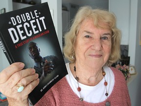 Dr. Agnes Chambers-Glenn has written a book called Double Deceit: A True Story of a Nigerian Scam, about a friend who was scammed out of thousands of dollars. (Michael Lea/The Whig-Standard)