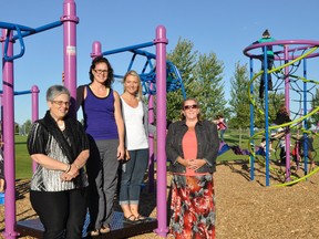 On hand for the ceremony were, from left, Vice-Principal Teresa Sargent; Jo-ann Horan, chair of the playground committee; Erin Richardson, playground committee member and Principal Paula Robinson.