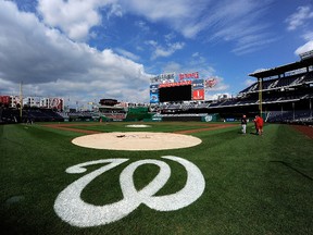The Washington Nationals postponed their game with the Atlanta Braves due to the shooting at the Washington Navy Yard that has left at least 12 dead. (Patrick McDermott/Getty Images/AFP)