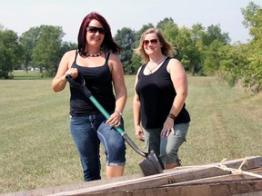 Cher Woodiwiss and Cassie Schakel are in the midst of building Strathroy’s Community Garden on Francis St., to be open in the spring of 2014. The pair hopes to bring a number of fresh, organic options to town.
JACOB ROBINSON/AGE DISPATCH/QMI AGENCY