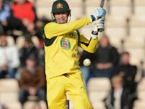 Australia’s Michael Clarke hits out during the fifth one-day international against England at the Rose Bowl in Southampton yesterday. Australia won by 49 runs. (Reuters)