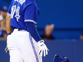 Toronto Blue Jays batter Moises Sierra reacts after striking out with the bases loaded to end the seventh inning during the Blue Jays' 3-1 loss to the Baltimore Orioles on Sept. 15, 2013 at the Rogers Centre. (DAVE ABEL/Toronto Sun)