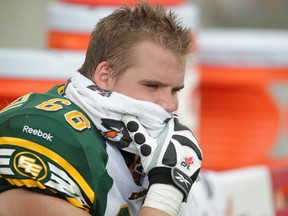 Edmonton Eskimos offensive lineman Matt O’Donnell sits on the bench during a CFL game against the Stampeders in Calgary on Sept. 2. (Al Charest/QMI Agency)