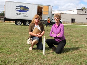 Jill Sanders (left) and Louise Lamb are concerned about contaminated soil that lies in the property across from their homes. MELANIE ANDERSON/THE OBSERVER/QMI AGENCY