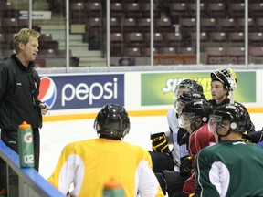 Trevor Letowski demonstrates systems to the Sarnia Sting during a recent practice at the RBC Centre. With the team roster set, Letowski is looking to instill a strong defensive system with his players. SHAUN BISSON/THE OBSERVER/ QMI AGENCY