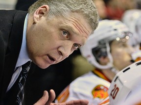 George Burnett marks his 10th season behind the Belleville Bulls bench in 2013-14. (Aaron Bell/OHL Images)
