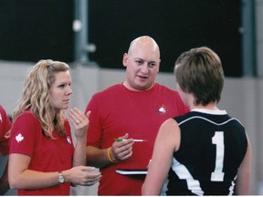 Kristin Trott, Canadian National Women’s Deaf Volleyball Team manger, interprets through American Sign Language for Head Coach, Joel Mrak and one of the players at the World Deaflympics in Sophia, Bulgaria in August. 
Submitted