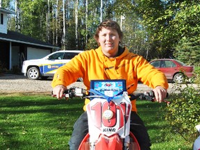 Michael King poses with one of the motorbikes he competed with at the Canadian Motocross Grand National Championship in Walton, Ont. King finished in seventh place in the MX1 Junior category.
Barry Kerton | Whitecourt Star