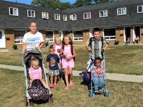 Jacklyn De Kort and her neighbours are upset that their children as young as three have to walk 20 minutes to London Road Public school every morning because they fall just 100 meters outside of the bus zone. MELANIE ANDERSON/THE OBSERVER/QMI AGENCY