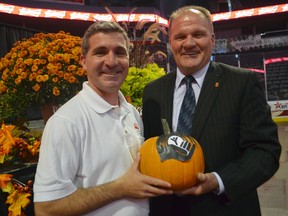 Andrew Lockie, CEO, United Way of London and Middlesex with Larry Myny, vice-president CIBC Wood Gundy and United Way's 2013 Campaign Chair at the 3M Harvest Lunch at Budweiser Gardens Sept.19, 2013. United Way announced its 2013 campaign goal of raising $8.9 million that day. SHOBHITA SHARMA/LONDONER/QMI AGENCY