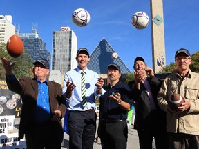 (left to right) City Councillors Ed Gibbons, Don Iveson, Edmonton Federation of Community Leagues (EFCL) board president Masood Makarechian, Ben Henderson, and Bryan Anderson take part in the kickoff for Community League Day in Churchill Square, in Edmonton, Alta., Thursday Sept. 19, 2013. The city wide festival will be held Sept. 21, 2013. David Bloom/Edmonton Sun/QMI Agency