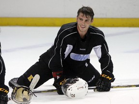 Kingston Frontenacs sophomore defenceman Roland McKeown stretches after practice at the Rogers K-Rock Centre on Wednesday. (Ian MacAlpine/The Whig-Standard)