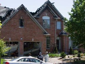 HRV units have been blamed for nine fires across the province, including one in May that destroyed a home on Hartson Place in the Oakridge area, pictured here. Firefighters thought they had extinguished a small fire in the laundry room and even used a thermal imaging camera. But the fire later erupted through the roof, and the damage was so extensive the home had to be demolished. (Free Press file photo)