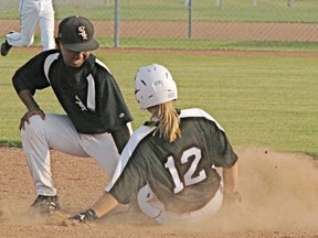 LeRon Smith applies the tag on a baserunner during Spruce Grove White Sox action earlier this year. Smith played in the U13 Western National Regional Baseball Championships in Spruce Grove and won the tournament’s homerun derby, showcasing his power at the plate, while also taking home the award for top defensive player. - Gord Montgomery, Reporter/Examiner