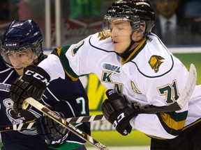 Knights? Chris Tierney battles for position against Francesco Vilardi of the Whalers in the first period. (MIKE HENSEN, The London Free Press)