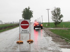Local roads leading into the IPM site were closed Saturday, as the final day of the 2013 International Plowing Match (IPM) was cancelled due to heavy rains and inclement weather. 

KRISTINE JEAN/THE MITCHELL ADVOCATE/QMI AGENCY