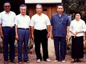 Pol Pot (2nd from right), notorious leader of Cambodia's Khmer Rouge, is shown in a rare photograph with other Khmer Rouge leaders at a camp in Western Cambodia in January, 1986.  (Reuters file photo)