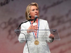Former U.S. Secretary of State Hillary Clinton speaks at the Liberty Medal ceremony after receiving the award, at the National Constitution Center in Philadelphia, Pa., on September 10, 2013. (REUTERS/Tom Mihalek)
