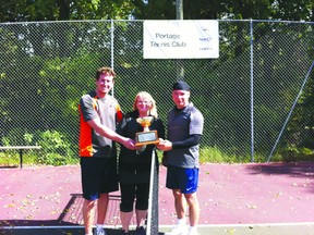 Rob Gamache and Darvin Lavallee pose with the Don MacLennan Doubles Tournament trophy along with MacLennan's widow, Helena, Sept. 22. (Submitted photo).
