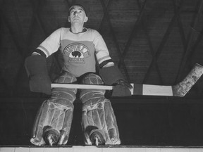 Bill Taugher stands atop the boards while wearing the uniform of the Buffalo Bisons. (Supplied photo)