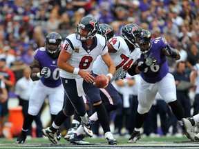 Houston Texans quarterback Matt Schaub looks to hand off against the Baltimore Ravens on Sunday. Schaub connected on 25 of his 35 passes for 194 yards and no touchdowns. He was also picked off once in the Texans’ 30-9 loss. (Getty Images/AFP)
